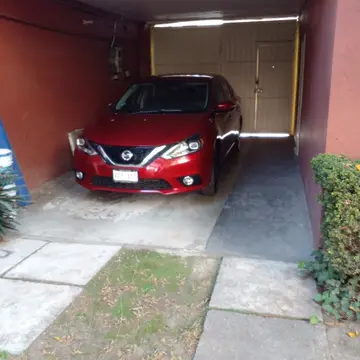 Nissan Sentra Exclusive Aut NAVI usado (2018) color Rojo Burdeos precio $325,000