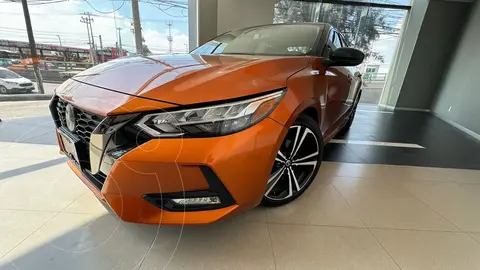 Nissan Sentra SR Aut usado (2022) color Naranja financiado en mensualidades(enganche $110,362 mensualidades desde $8,439)