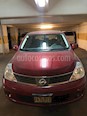 Nissan Tiida Sedan Custom Ac usado (2007) color Rojo Vivo precio $65,000