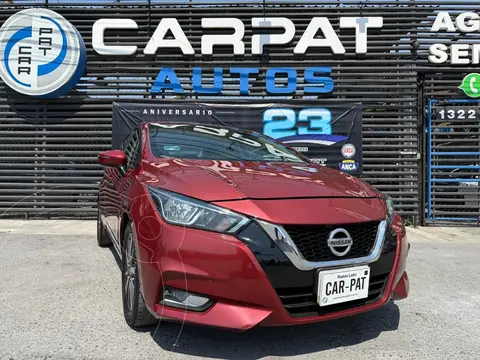 Nissan Versa Advance usado (2021) color Rojo financiado en mensualidades(enganche $59,180 mensualidades desde $6,168)