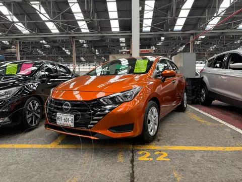 Nissan Versa Sense usado (2023) color Naranja financiado en mensualidades(enganche $63,400 mensualidades desde $5,700)
