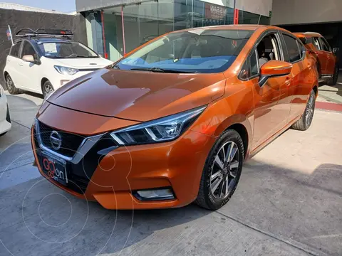 Nissan Versa Advance usado (2021) color Naranja financiado en mensualidades(enganche $72,212 mensualidades desde $5,522)
