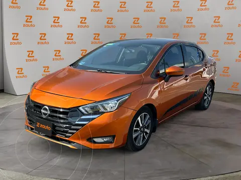 Nissan Versa Advance usado (2021) color Naranja financiado en mensualidades(enganche $59,378 mensualidades desde $7,138)