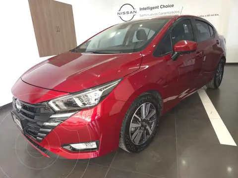 Nissan Versa Advance Aut usado (2023) color Rojo financiado en mensualidades(enganche $77,000 mensualidades desde $7,596)