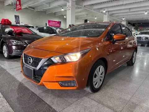 Nissan Versa Sense usado (2020) color Naranja financiado en mensualidades(enganche $64,038 mensualidades desde $4,899)