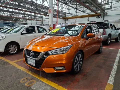Nissan Versa Exclusive Aut usado (2020) color Naranja financiado en mensualidades(enganche $60,900 mensualidades desde $5,600)