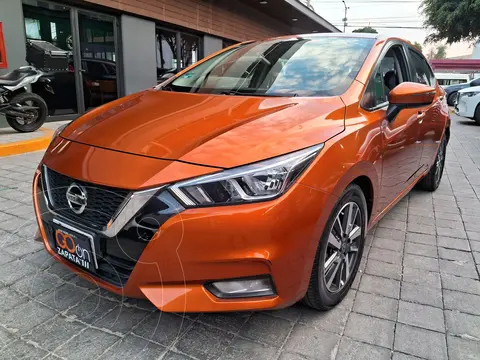 Nissan Versa Advance usado (2021) color Naranja financiado en mensualidades(enganche $70,850 mensualidades desde $5,418)