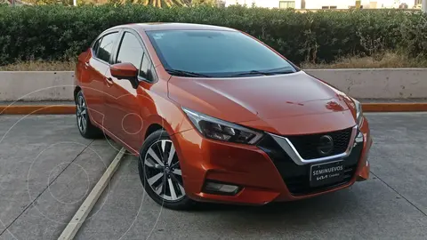 Nissan Versa Platinum Aut usado (2020) color Naranja financiado en mensualidades(enganche $61,514 mensualidades desde $7,078)