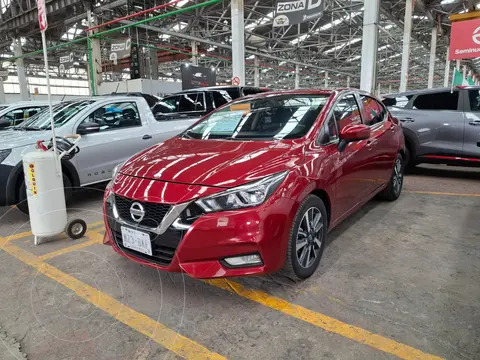 Nissan Versa Advance usado (2022) color Rojo Scarlet financiado en mensualidades(enganche $62,500 mensualidades desde $5,600)