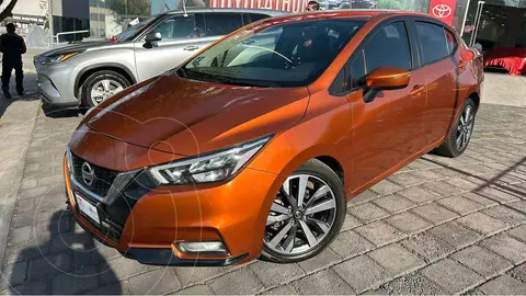 Nissan Versa Exclusive Aut usado (2020) color Naranja financiado en mensualidades(enganche $72,294 mensualidades desde $7,693)