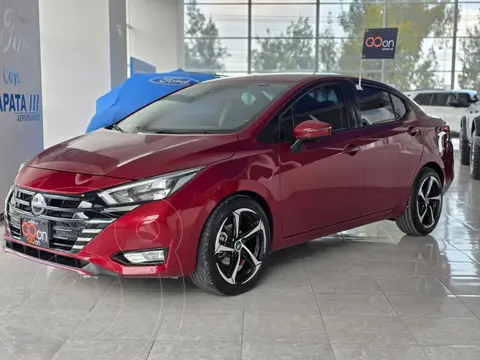 Nissan Versa Exclusive Aut usado (2023) color Rojo Cobrizo financiado en mensualidades(enganche $92,378 mensualidades desde $7,064)