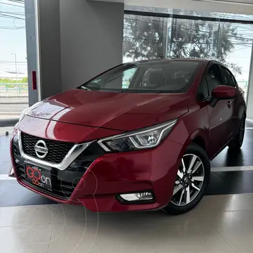 Nissan Versa Advance usado (2022) color Rojo financiado en mensualidades(enganche $82,840 mensualidades desde $6,335)