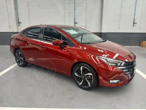 Nissan Versa Exclusive Aut usado (2023) color Rojo financiado en mensualidades(enganche $124,982 mensualidades desde $5,259)