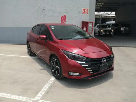 Nissan Versa Exclusive Aut usado (2023) color Rojo financiado en mensualidades(enganche $120,088 mensualidades desde $5,731)