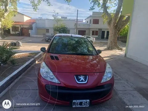 Peugeot 207 Compact 1.4 Allure 5P usado (2010) color Rojo Aden precio $9.000.000