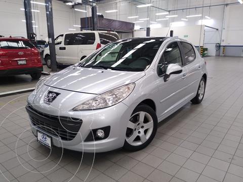 Peugeot 207 5P Feline usado (2013) color Plata Dorado precio $118,000