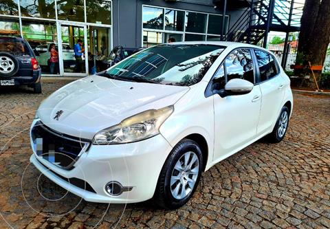 foto Peugeot 208 Active 1.5 usado (2013) color Blanco precio $1.350.000