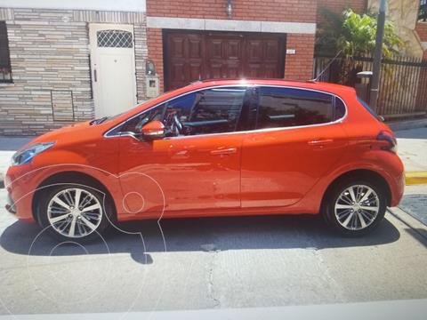 foto Peugeot 208 Feline 1.6 usado (2017) color Rojo Aden precio $1.500.000