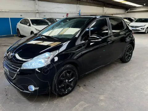 Peugeot 208 Allure 1.6 usado (2014) color Negro precio $15.000.000