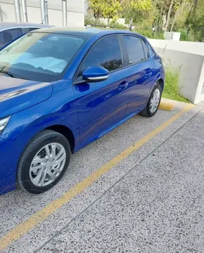 Peugeot 208 Active 1.6 Pack usado (2023) color Azul financiado en cuotas(anticipo $3.000.000 cuotas desde $200.000)