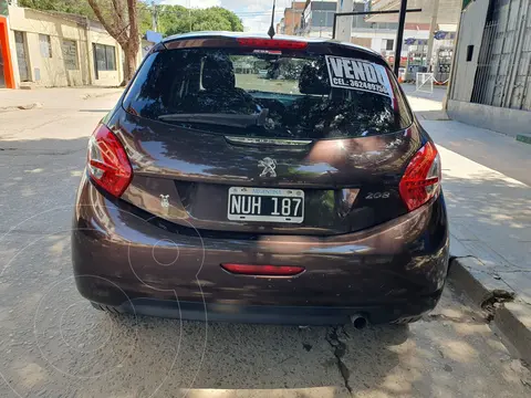 Peugeot 208 Active 1.5 usado (2014) color Rouge Noir precio $11.000.000