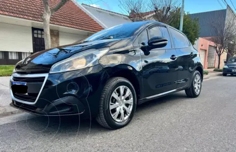 Peugeot 208 Active 1.5 usado (2017) color Negro Perla financiado en cuotas(anticipo $6.000.000 cuotas desde $390.000)