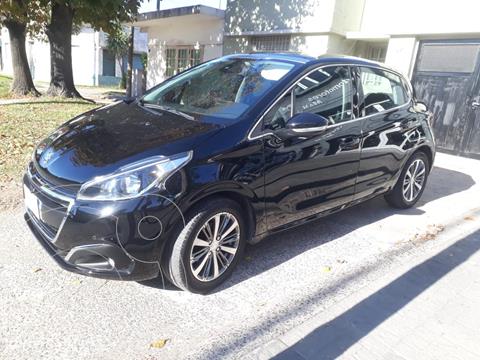 foto Peugeot 208 Feline 1.6 usado (2018) color Negro Perla precio $2.100.000