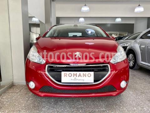 foto Peugeot 208 Feline 1.6 Pack Cuir usado (2013) color Rouge Noir precio $1.250.000