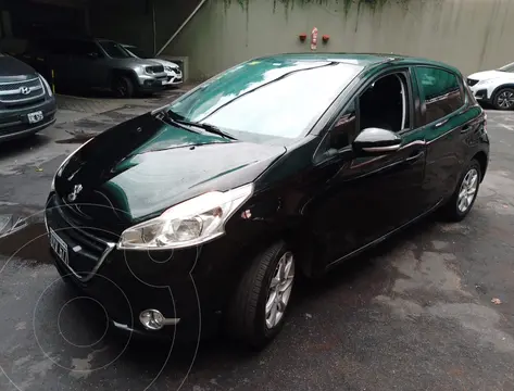 Peugeot 208 Allure 1.5 Full usado (2015) color Negro Perla precio $9.000.000