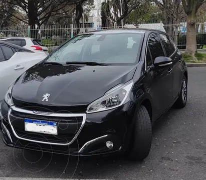 Peugeot 208 Feline 1.6 usado (2017) color Negro Perla financiado en cuotas(anticipo $3.000.000 cuotas desde $235.000)