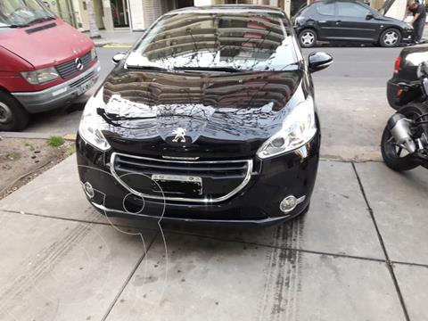 foto Peugeot 208 Feline 1.6 Pack Cuir usado (2015) color Negro precio $1.390.000