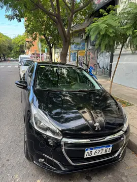 Peugeot 208 Allure 1.6 usado (2017) color Rojo Aden financiado en cuotas(anticipo $9.000.000 cuotas desde $600.000)
