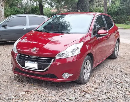 Peugeot 208 Allure 1.5 usado (2013) color Rouge Ruby precio $12.700.000