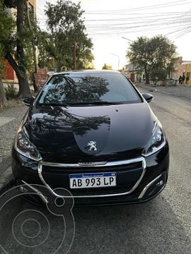 Peugeot 208 Feline 1.6 usado (2018) color Negro precio $2.700.000