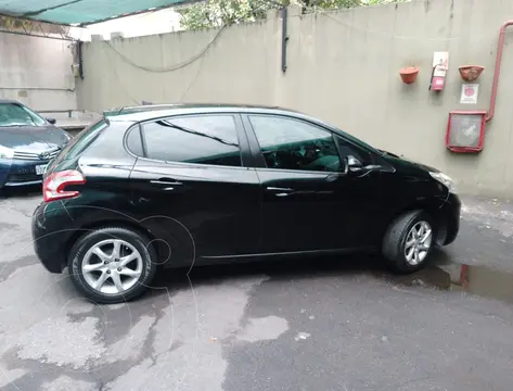 Peugeot 208 Allure 1.5 usado (2015) color Negro precio $13.500.000