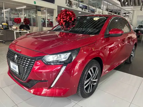 Peugeot 208 Allure usado (2022) color Rojo financiado en mensualidades(enganche $89,924 mensualidades desde $6,879)