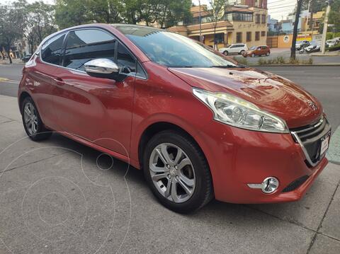 Peugeot 208 1.6L Feline usado (2015) color Rojo Rubi precio $168,000