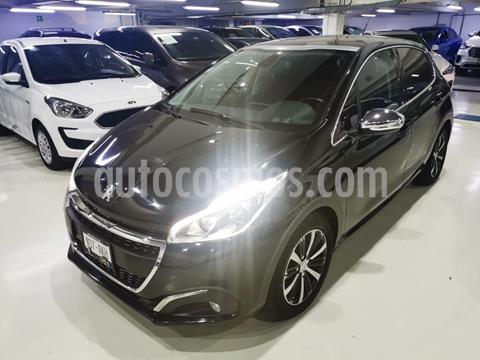 foto Peugeot 208 1.6L Féline usado (2017) color Negro precio $184,100