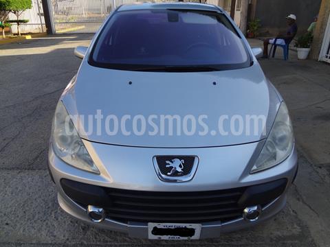 foto Peugeot 307 CC 2.0L Tiptronic usado (2008) color Plata precio u$s2.000