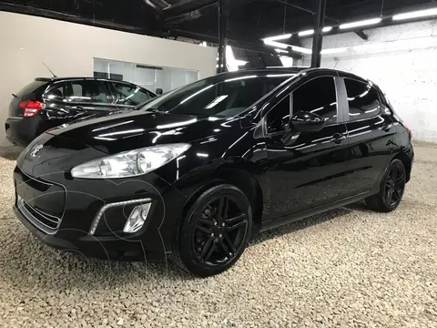 foto Peugeot 308 Feline usado (2012) color Negro precio $2.900.000