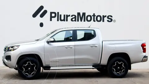 RAM 1200 Bighorn Crew Cab usado (2025) color plateado financiado en mensualidades(enganche $118,580 mensualidades desde $10,103)