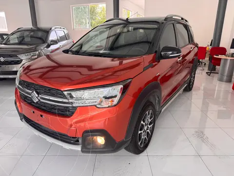 Suzuki Ertiga XL7 GLX Aut usado (2023) color Naranja precio $330,000