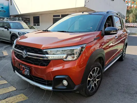 Suzuki Ertiga XL7 GLX Aut usado (2023) color Naranja financiado en mensualidades(enganche $94,012 mensualidades desde $7,189)