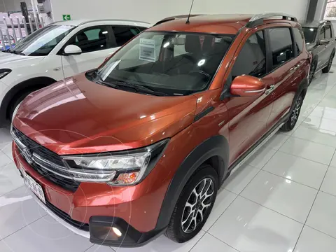 Suzuki Ertiga XL7 GLX Aut usado (2022) color Naranja precio $325,000