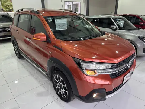 Suzuki Ertiga XL7 GLX Aut usado (2022) color Naranja financiado en mensualidades(enganche $90,192 mensualidades desde $7,719)