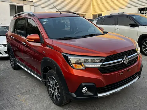 Suzuki Ertiga XL7 GLX Aut usado (2022) color Naranja financiado en mensualidades(enganche $78,750)