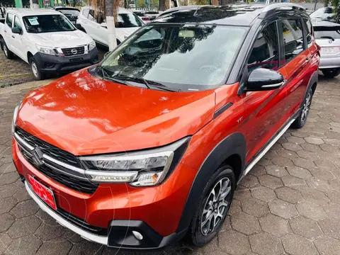 Suzuki Ertiga XL7 GLX Aut usado (2023) color Naranja financiado en mensualidades(enganche $93,256 mensualidades desde $8,283)