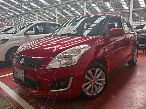 Suzuki Swift GLS Aut usado (2015) color Rojo Rock financiado en mensualidades(enganche $42,000 mensualidades desde $4,500)