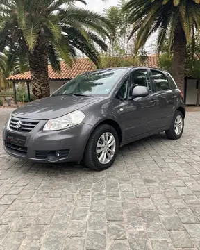 Suzuki SX4 GLX AC usado (2014) color Gris Perla precio $6.990.000