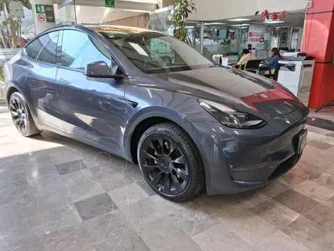 Tesla Model Y Autonomia Mayor usado (2023) color Gris financiado en mensualidades(enganche $292,182 mensualidades desde $12,293)